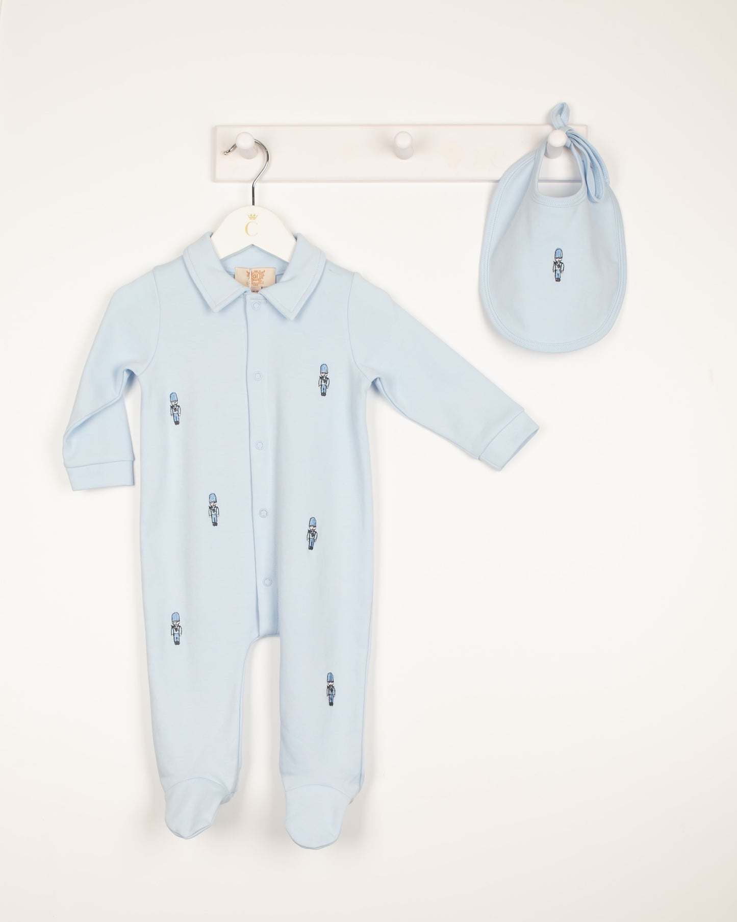 Caramelo Kids, All in ones, Caramelo Kids - Pale blue all in one and bib, soldier design