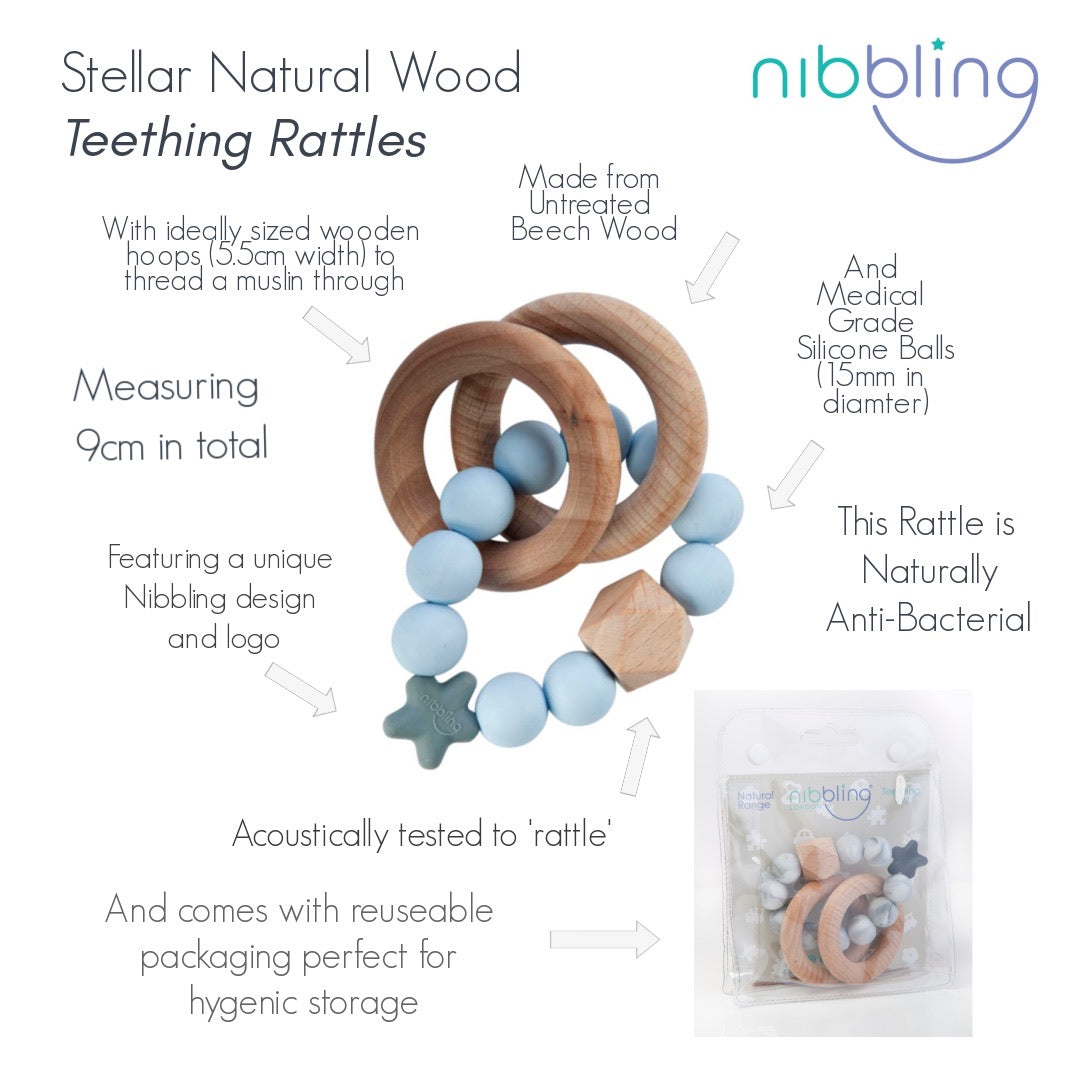 Nibbling  - Stellar natural wood rattle teething ring, blue | Betty McKenzie